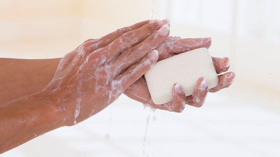 Washing-hands-with-a-bar-of-soap.