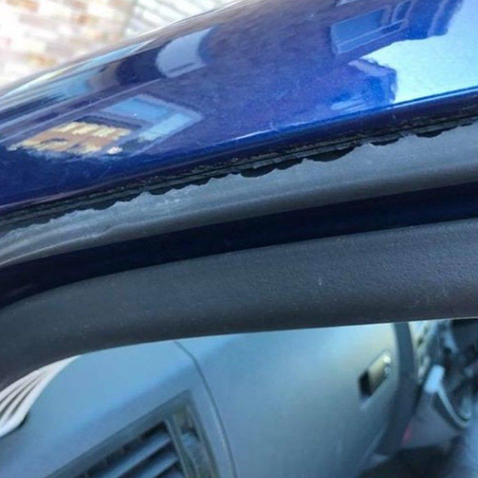 Damage to the seal on the windows of one car