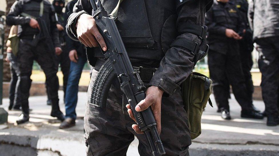 File photo showing Egyptian police special forces standing guard in Cairo's Tahrir Square on 25 January 2016