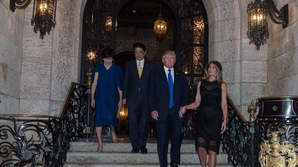 The Trumps pose for photos with Prime Minister Shinzo Abe and his wife, Akie