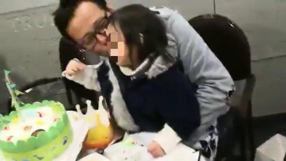 Picture of freed Chinese artist Hua Yong and his daughter