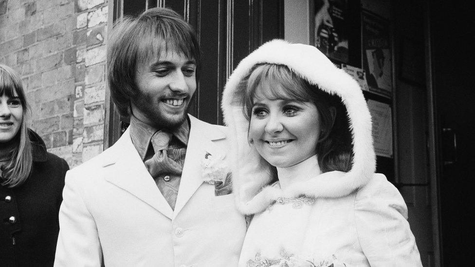 Lulu marries the Bee Gee Maurice Gibb in Gerrards Cross