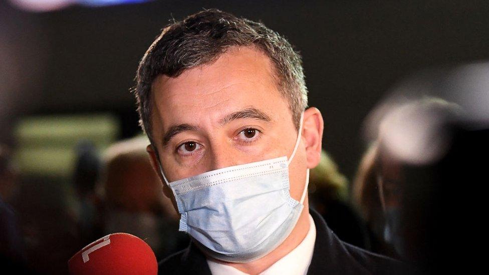 French Interior Minister Gerald Darmanin speaks to the press outside Calais Hospital