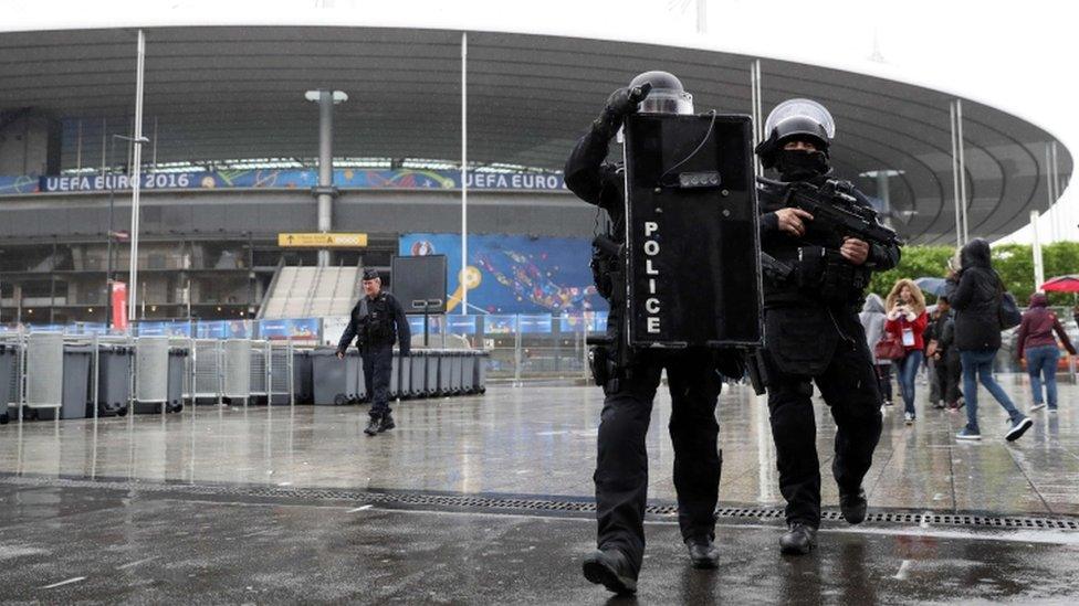 French police take part in a training exercise outside the State de France in Paris