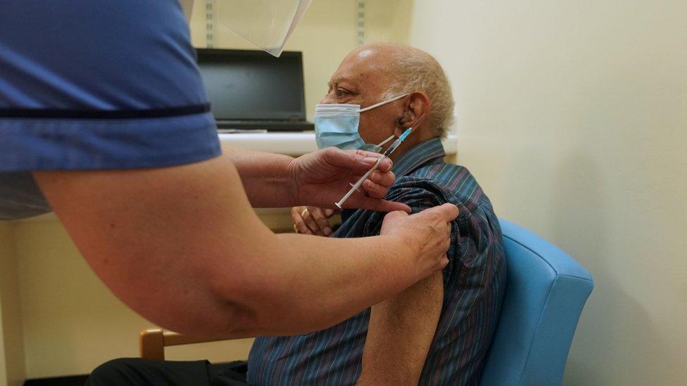 Dr Hari Shukla receiving the Pfizer/BioNTech vaccine