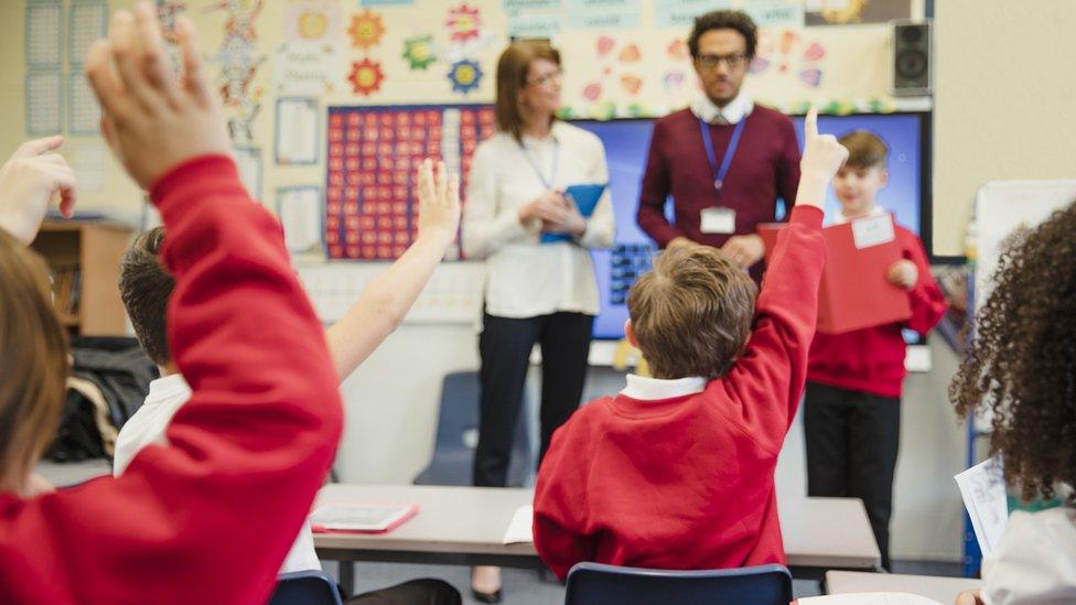 Schoolchildren in classroom