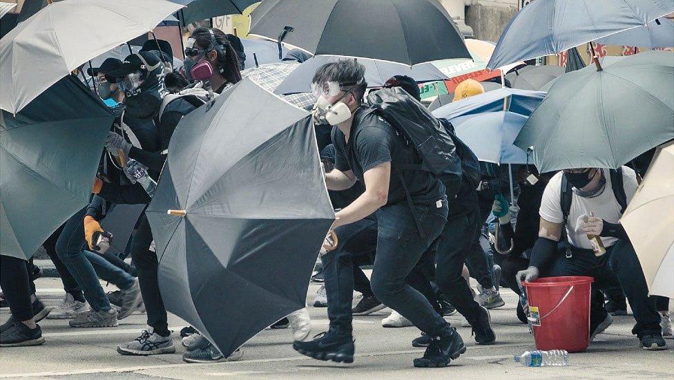 Demonstrators used umbrellas as shields last year, a tactic learnt during the Umbrella Movement of 2014