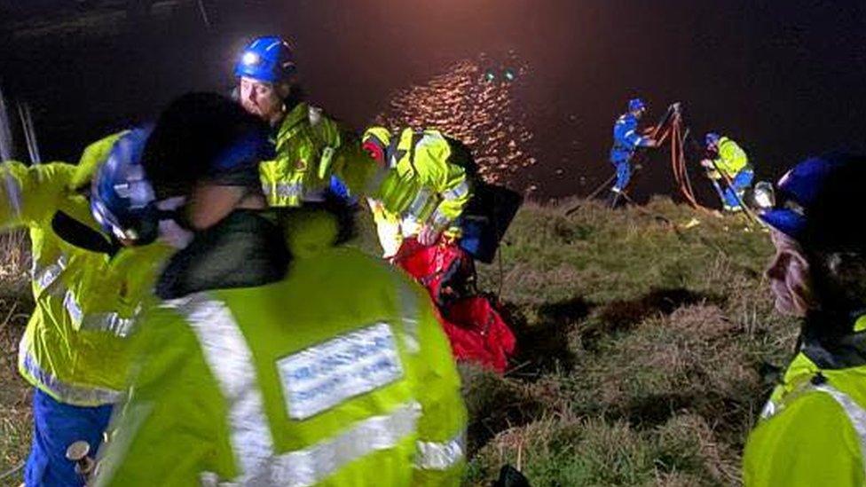 Rescuers used ropes to abseil down and rescue the pet dog