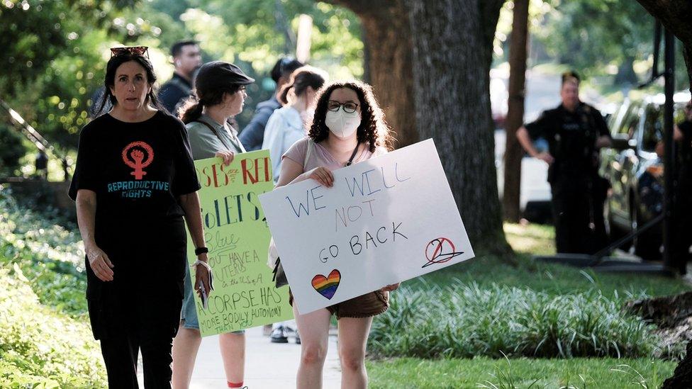 protesters outside the home of supreme court justice brett kavanaugh