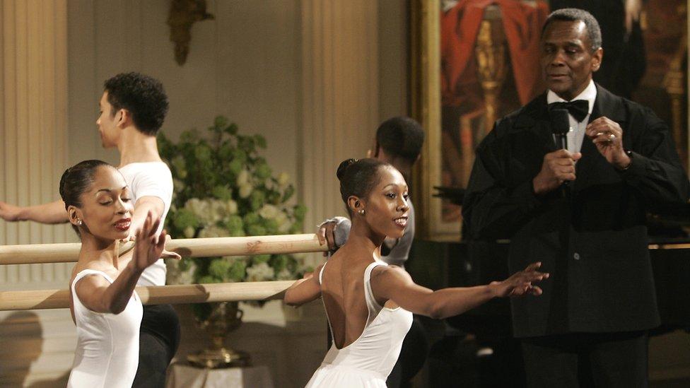 Arthur Mitchell (R) introduces his dancers during the entertainment in honour of the Dance Theatre of Harlem and at the White House in Washington DC, 6 February 2006