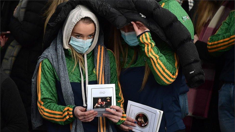 People line the street for the funeral of Ashling Murphy at St. Brigid’s Church, County Offaly on January 18, 2022 in Tullamore, Ireland. . (Photo by Charles McQuillan/Getty Images)