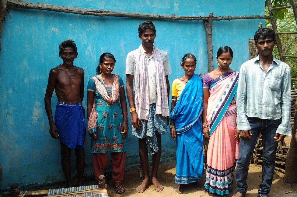 Left to right: Makaru's father, Makaru's daughter Nilandri (18), Makaru, wife Bimla, daughter-in-law and one of their two sons, Gabara (23)