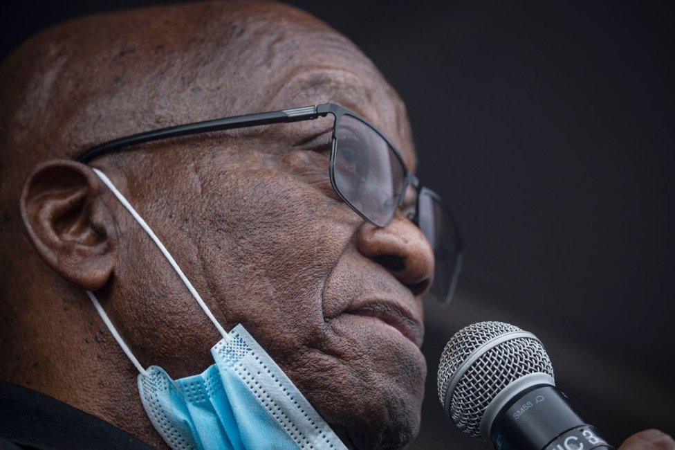 Former South African president Jacob Zuma addresses his supporters in front of his rural home in Nkandla on July 4, 2021