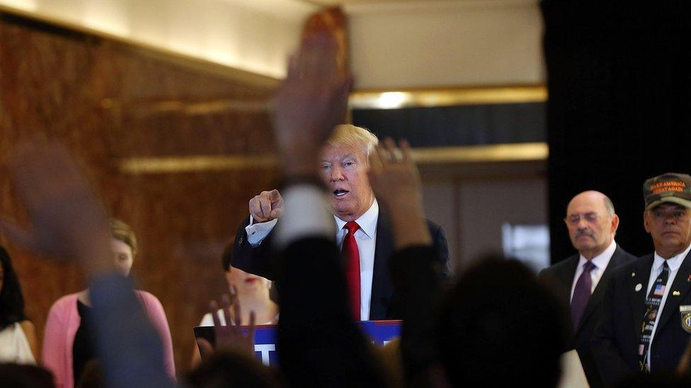 Donald Trump speaks at a news conference at Trump Tower