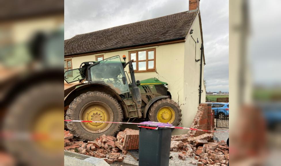 tractor crashed through house