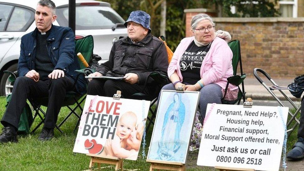 Anti-abortion campaigners outside clinic