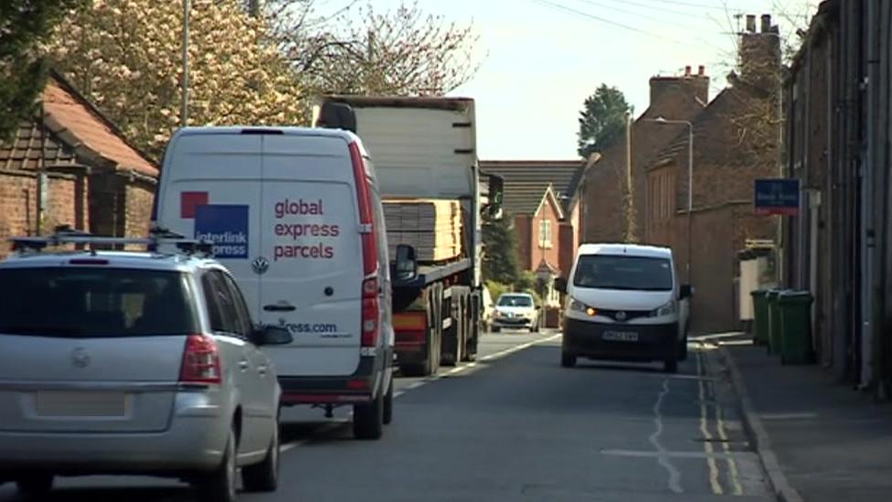 Vehicles in road