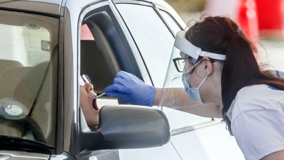 A person is tested at Temple Green Park and Ride Coronavirus testing centre in Leeds