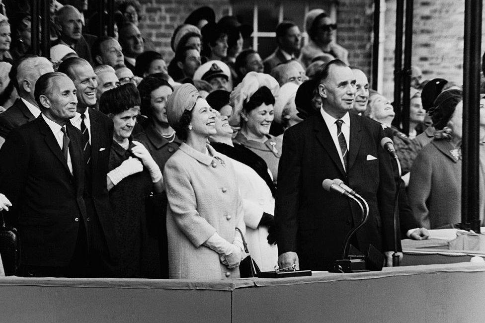 Queen Elizabeth and Dr John Rannie attend the launching of the Queen Elizabeth 2. (Photo by Hulton-Deutsch/Hulton-Deutsch Collection/Corbis via Getty Images)