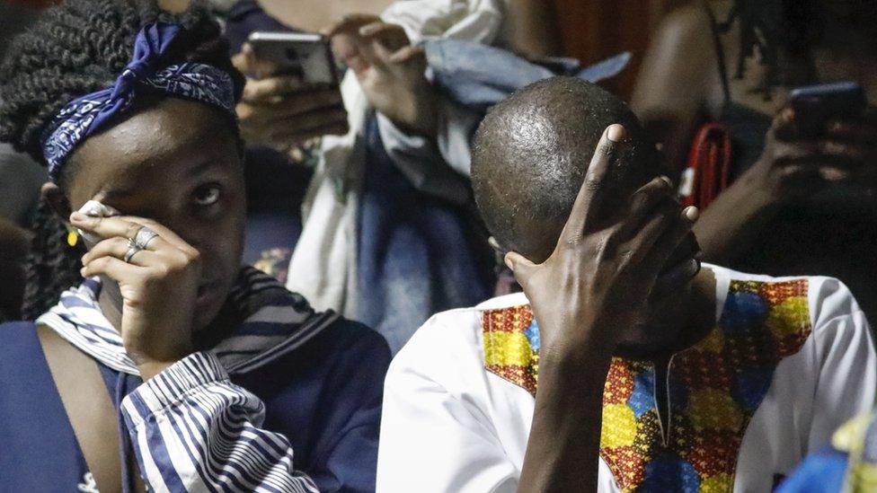 People at court react as they listen to a judge reads a statement upholding the country's anti-gay law at Milimani High Court in Nairobi, Kenya, 24 May 2019.