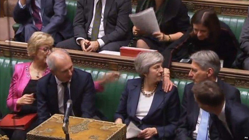 Colleagues congratulate Theresa May on her Commons speech