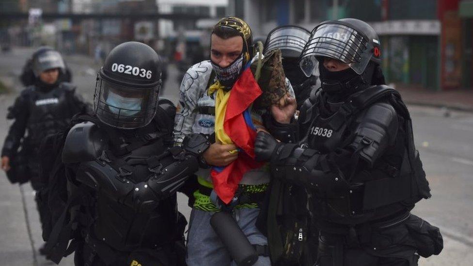 Protesters clash with ESMAD members in the second day of protests against the tax reform proposed by the government of Ivan Duque, in Cali, Colombia, 29 April 2021