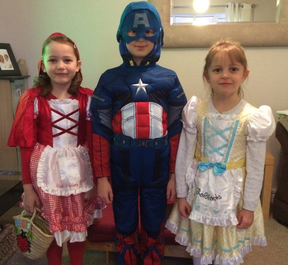 Josh 8, Maisie 6, Hollie 5 dressed up for world book day with the dog jake we are from Dawlish Devon