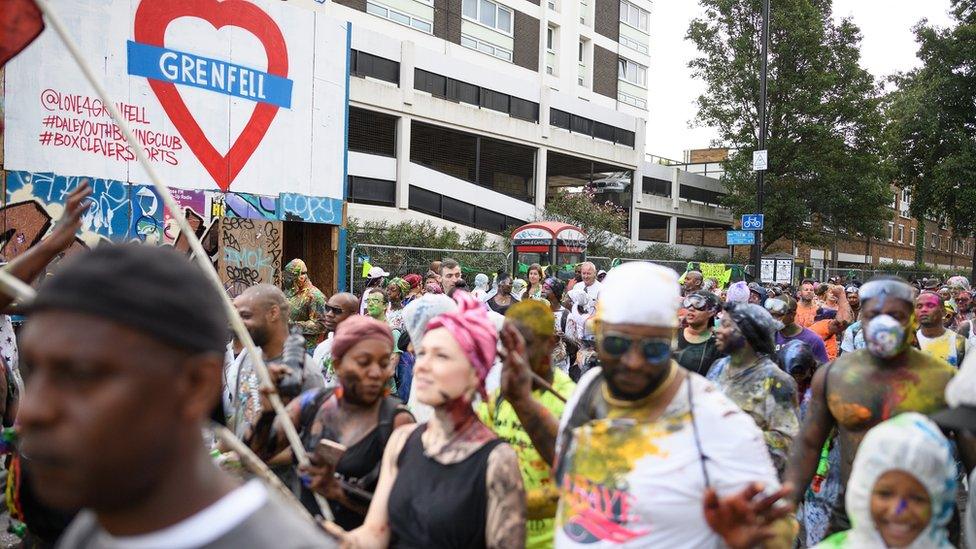 Paint covered revellers at Notting Hill carnival