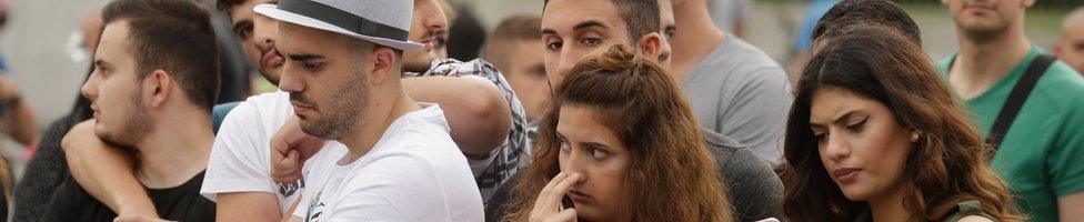 People mourn the victims of the Munich attack, 23 July