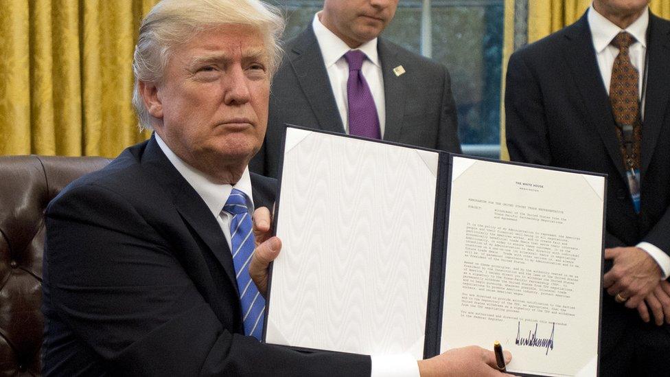 President Trump signs an executive order withdrawing from TPP