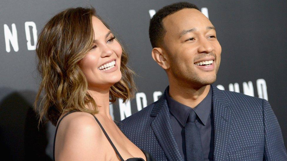 Chrissy Teigan and John Legend photographed together at event in March 2017