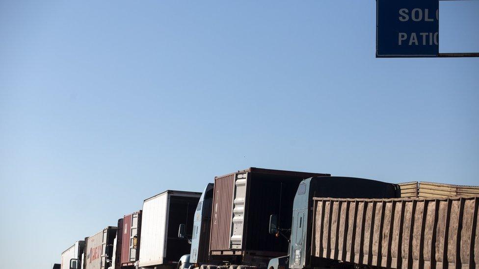 Trucks line up at the Mexico-United States border