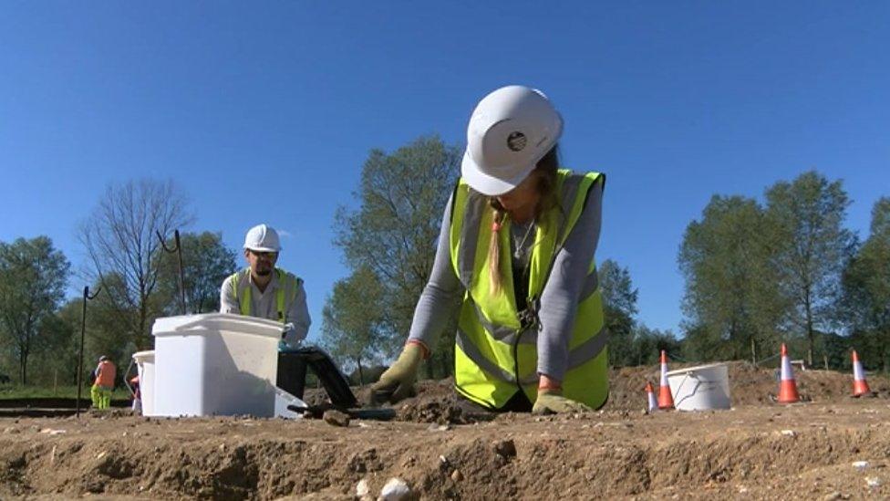 Archaeologists on the site