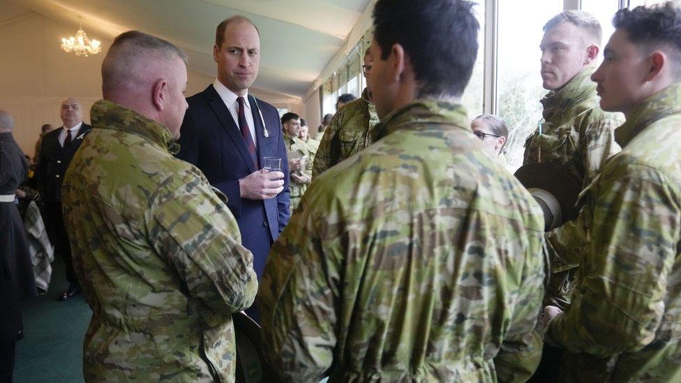 The Prince of Wales meeting troops from the 5th Royal Australian Regiment