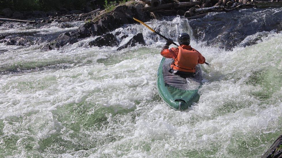 A kayaker on the river