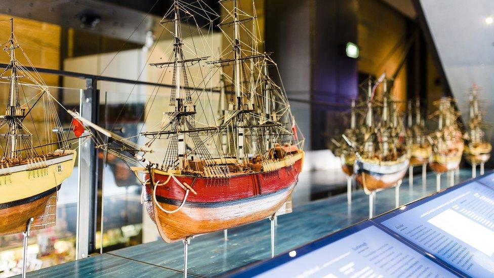 Models of ships from early British settlement in Australia on display at a museum in Sydney