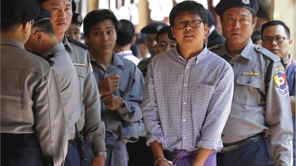 Detained Reuters journalist Wa Lone (2-R) and Kyaw Soe Oo (2-L) are escorted by police as they leave the court after the hearing in Yangon, Myanmar, 01 February 2018.