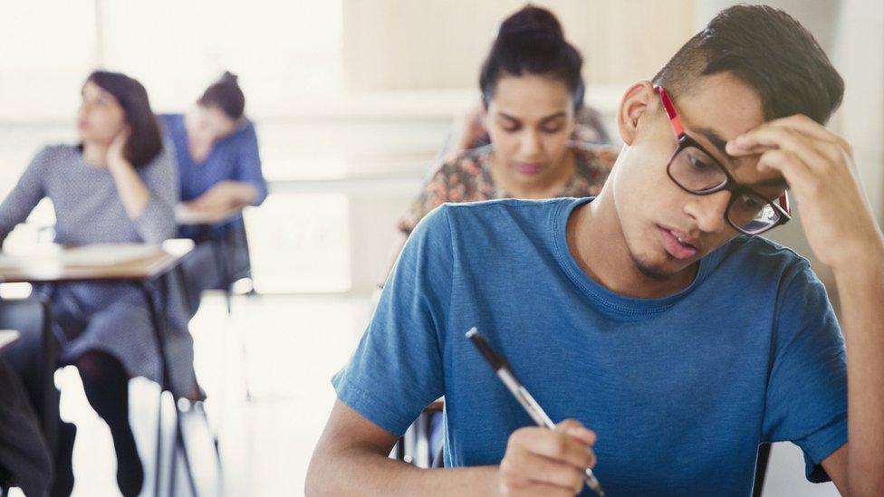 Students sitting exams