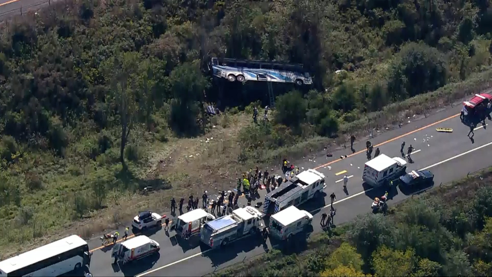 Emergency officials at the crash site