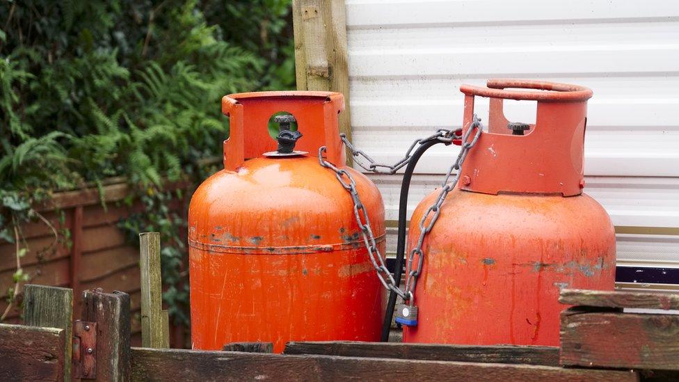 Calor gas cylinder bottles at caravan park site UK - Stock photo