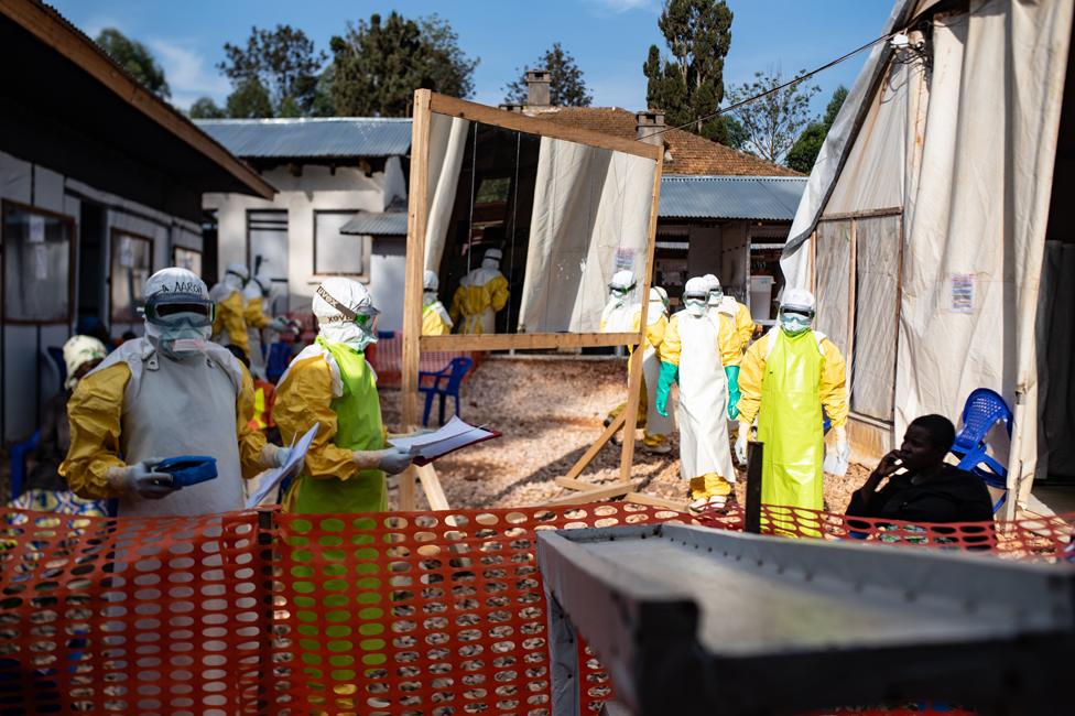 Health workers in protective clothing