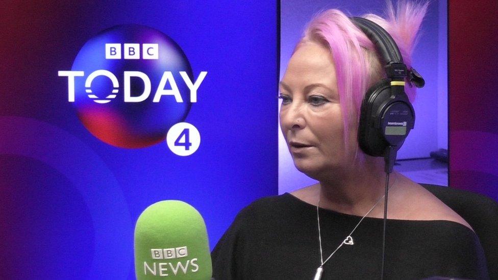 Charlotte Charles wearing headphones in a radio studio