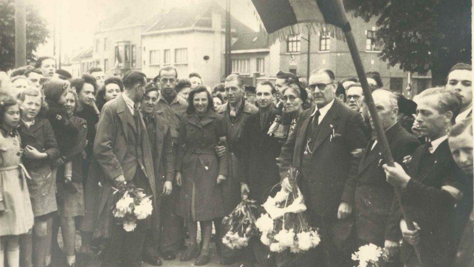 A picture of the welcome home ceremony for Josephine Van Durme