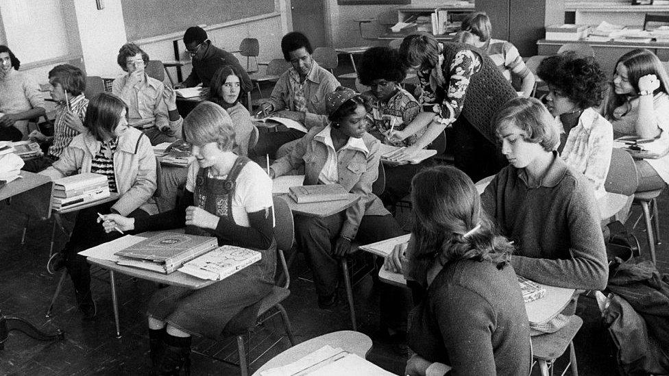 An initiative to desegregate Boston Public Schools was implemented in the fall of 1974 and was met with strong resistance from many residents of Boston's neighborhoods