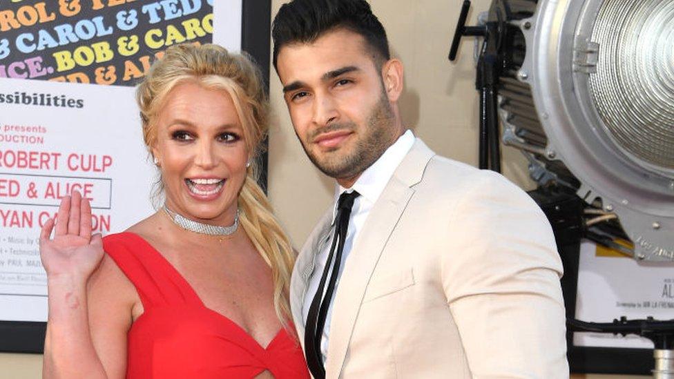 Britney Spears and Sam Asghari at a film premiere on 22 July 2019 in Hollywood, California