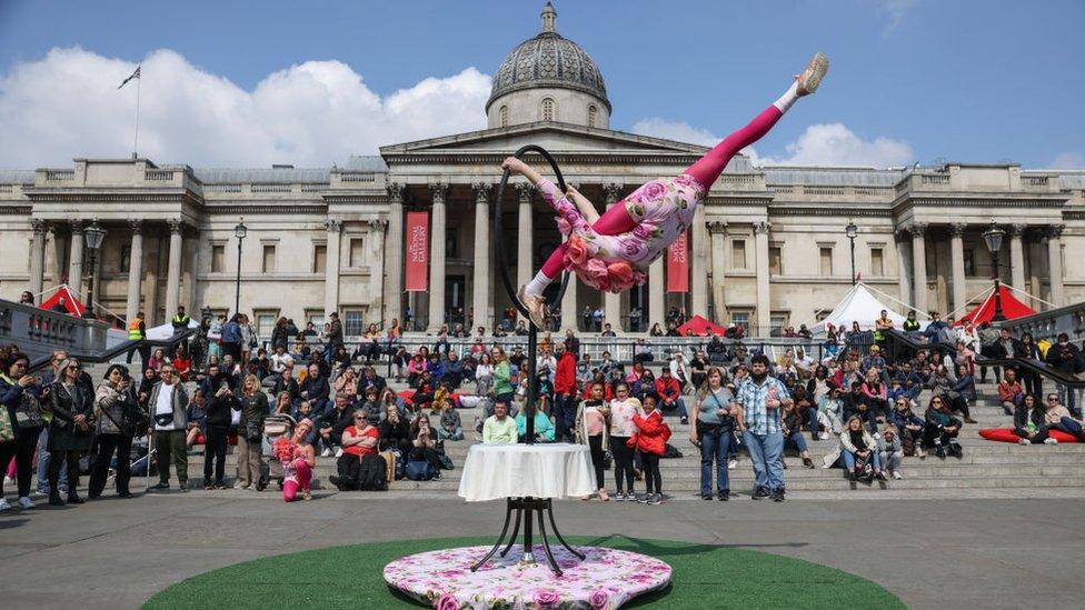 Acrobats perform at the Feast of St George celebrations in Trafalgar Square