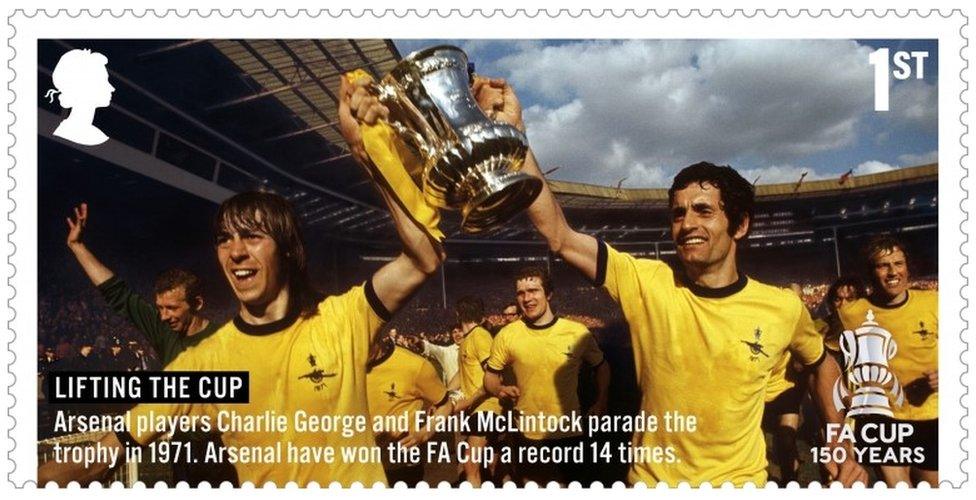 Undated handout photo issued by Royal Mail of the stamp showing Lifting the Cup - Arsenal players Charlie George and Frank McLintock parading the trophy in 1971,