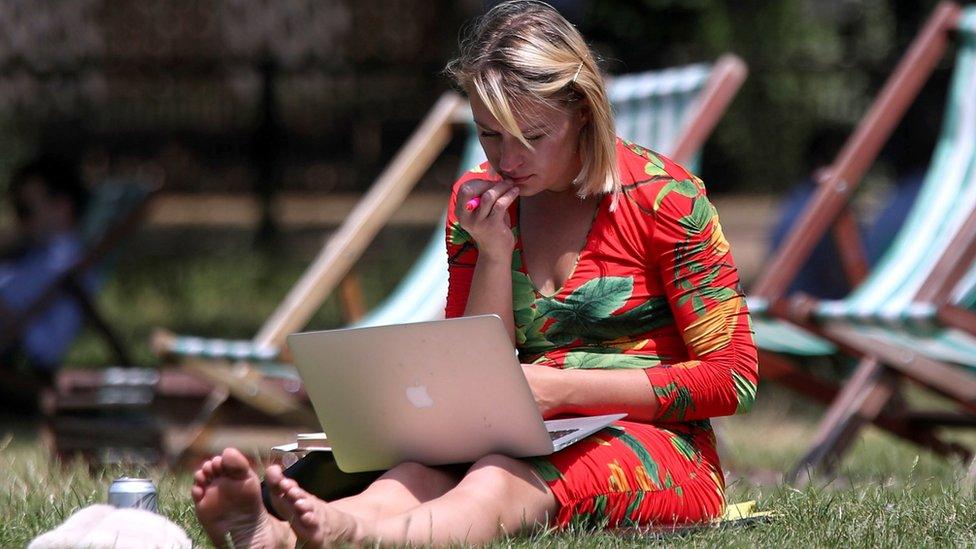 A woman in Green Park in London