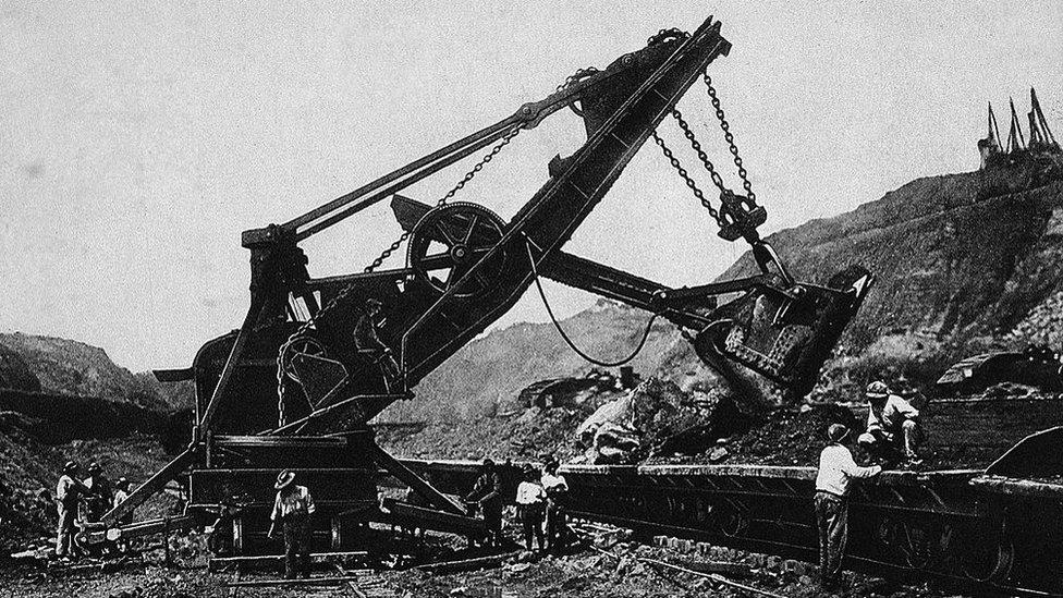 A shovel vehicle operates during the construction of the Panama Canal, Panama, circa 1906