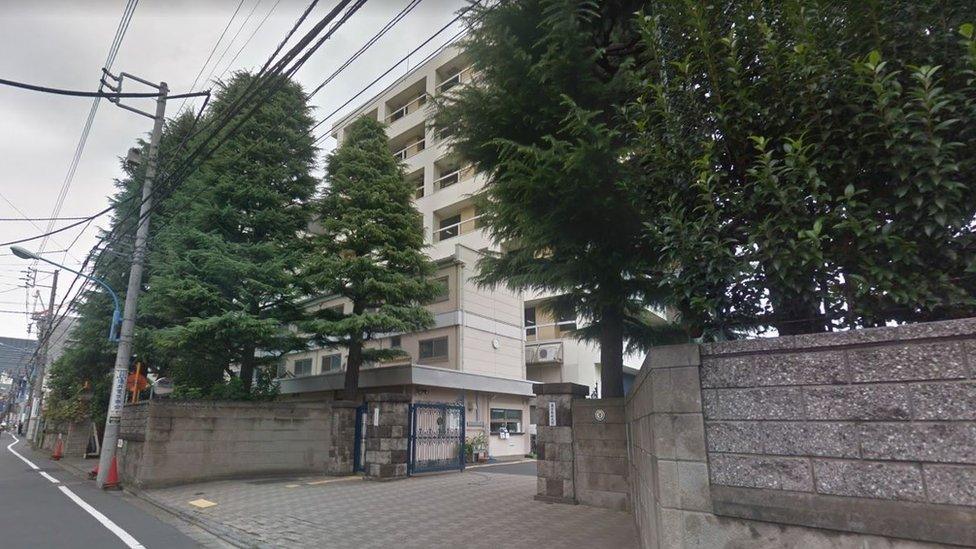 The Tokyo Medical University is seen behind trees in Google street view mode